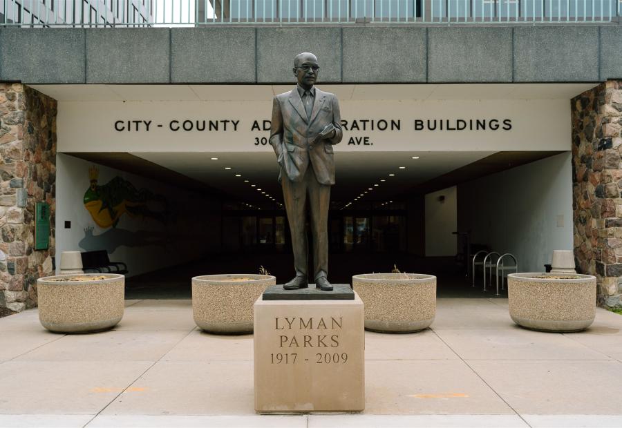 Sculpture of Mayor Lyman Parks, leading the way in the Grand Rapids Community Legends Sculpture Tour.